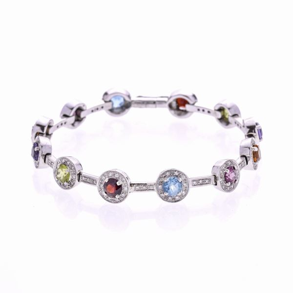 Bracelet in white gold, diamonds and crystals of different colors