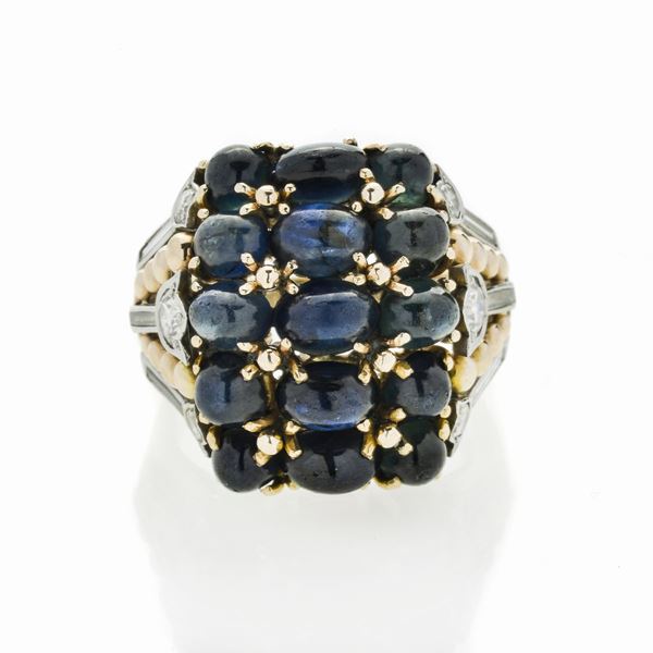 Ring in yellow gold, white gold, diamonds and sapphires