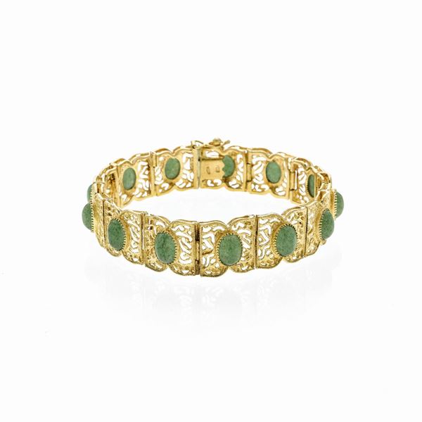 Bracelet in yellow gold and green hard stone