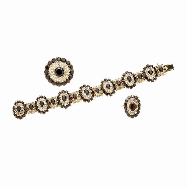 Parure in yellow gold and garnet