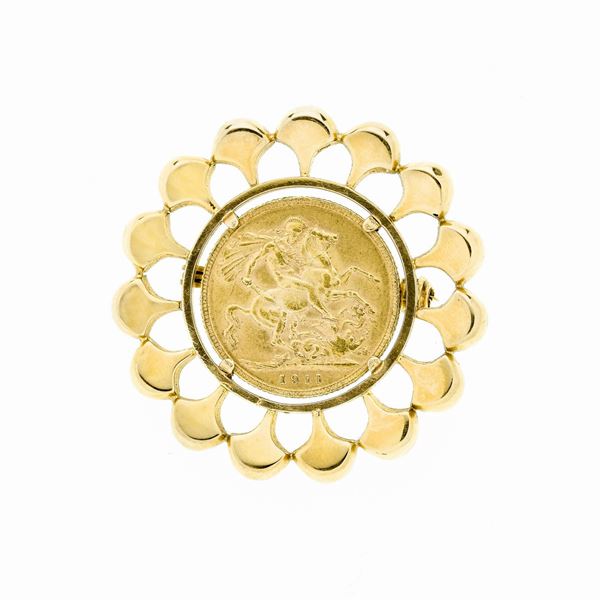Brooch with coin in yellow gold