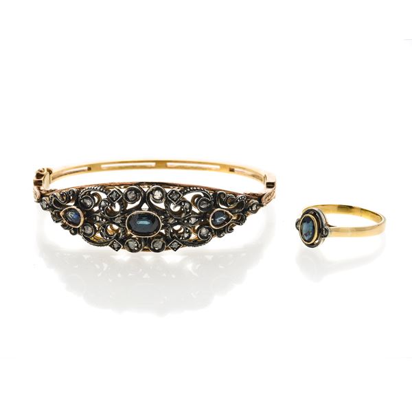 Lot with rigid bracelet and ring in yellow gold, silver, diamonds and sapphires