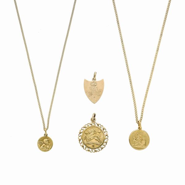 Lot of two chains and two medals in yellow gold