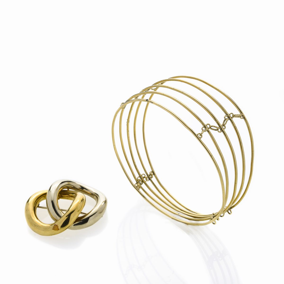 Lotto di Bracciale e Spilla in Oro Giallo e Oro Bianco