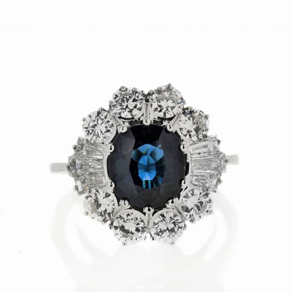 Ring in white gold, diamonds and sapphire