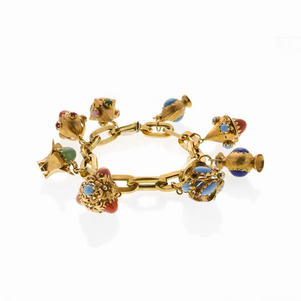 Bracciale in oro giallo, corallo, turchese e lapislazzulo