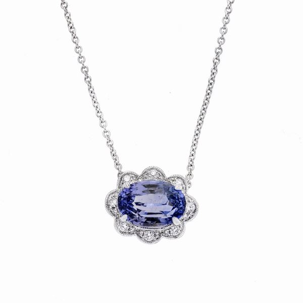 Pendant in white gold, diamonds and natural sapphire