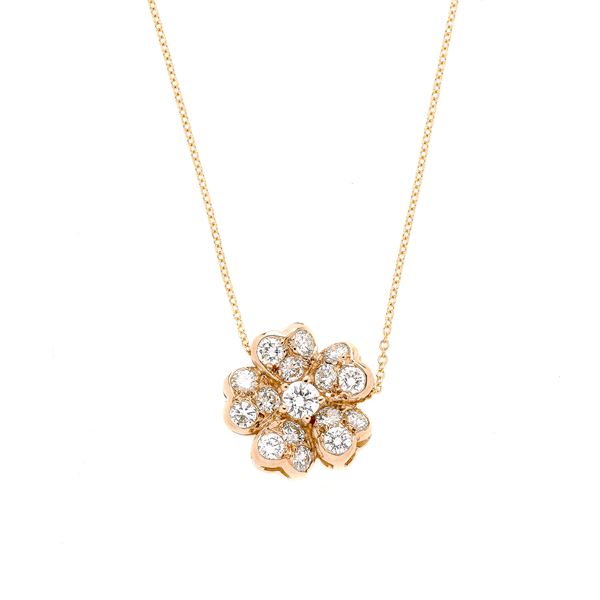 Flower pendant in yellow gold and diamonds
