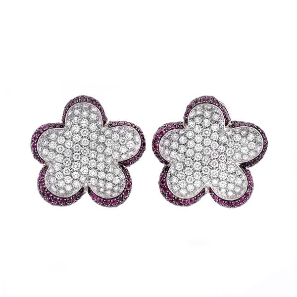Pair of white gold, diamond and ruby clip-on earrings