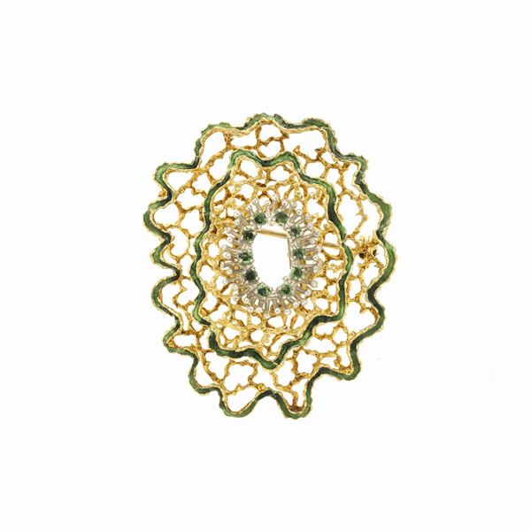 Brooch in yellow gold, green enamel and emeralds