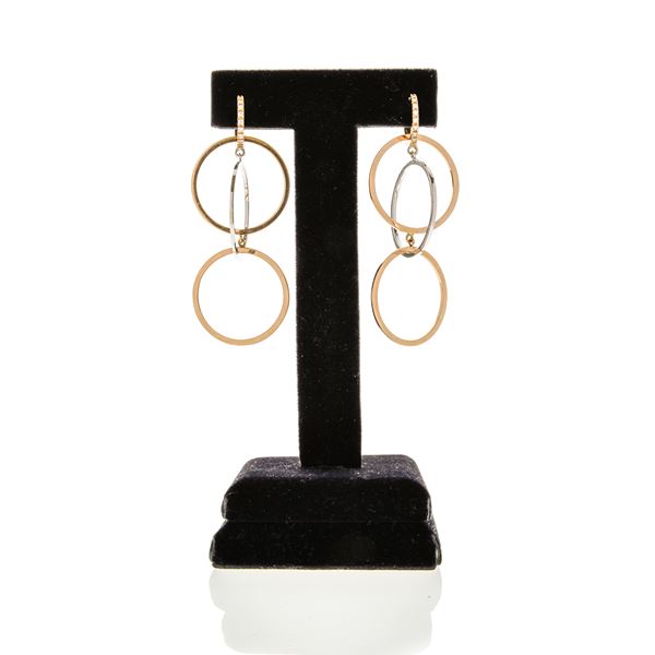 Pair of hoop earrings in white gold, rose gold and diamonds
