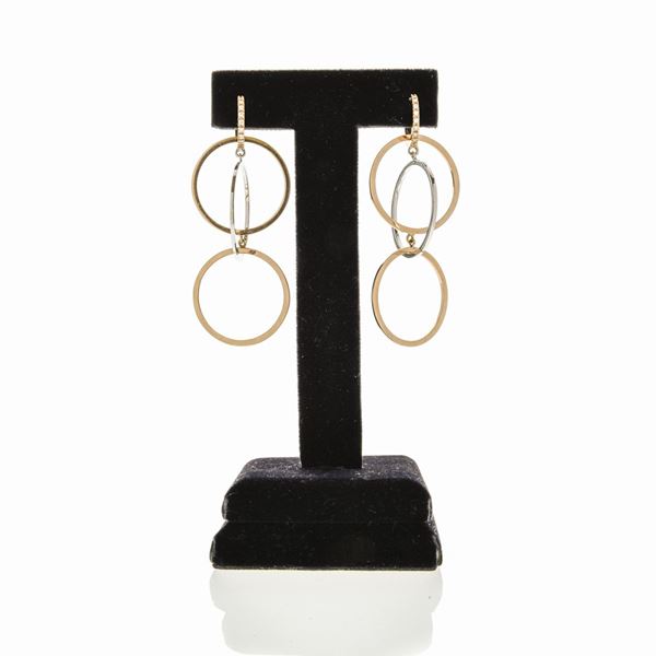 Pair of hoop earrings in white gold, rose gold and diamonds