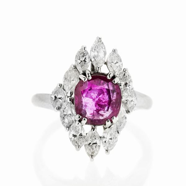 Anello in oro bianco, diamanti  e rubino