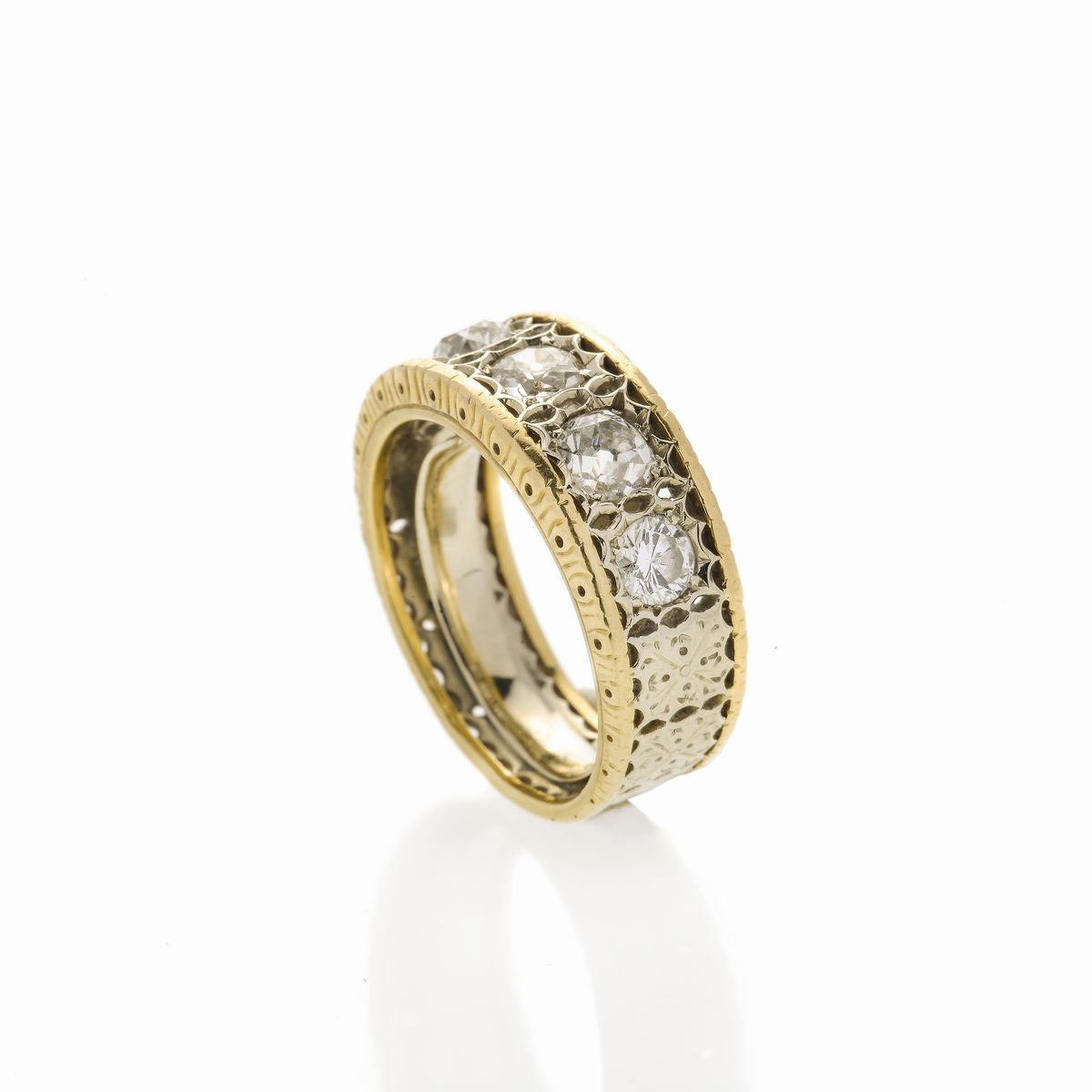 Anello a fascia in oro giallo, oro bianco e diamanti
