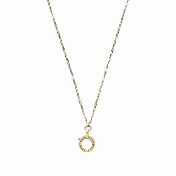Long watch chain in yellow gold and pearls