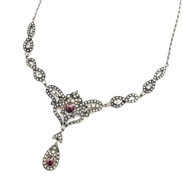 Necklace in low titer gold, silver, diamonds and rubies