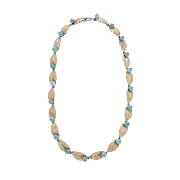 Necklace in yellow gold and jade
