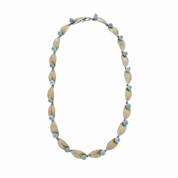 Necklace in yellow gold and jade