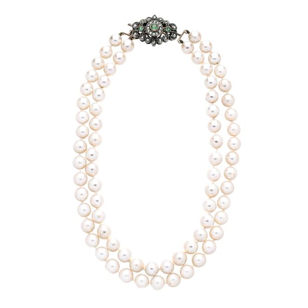 Necklace made of two-strand string of pearls, low gold, silver, diamonds and emeralds