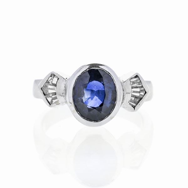 Ring in white gold, diamonds and sapphire