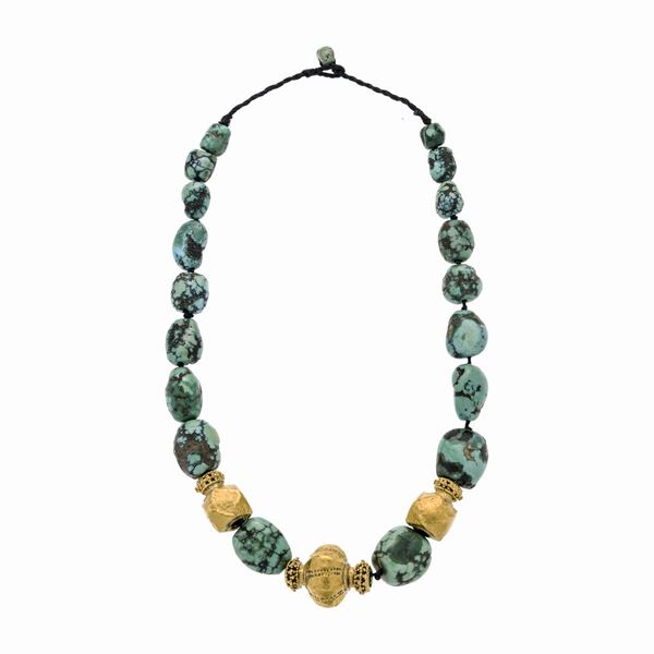 Necklace in yellow  gold and turquoise 