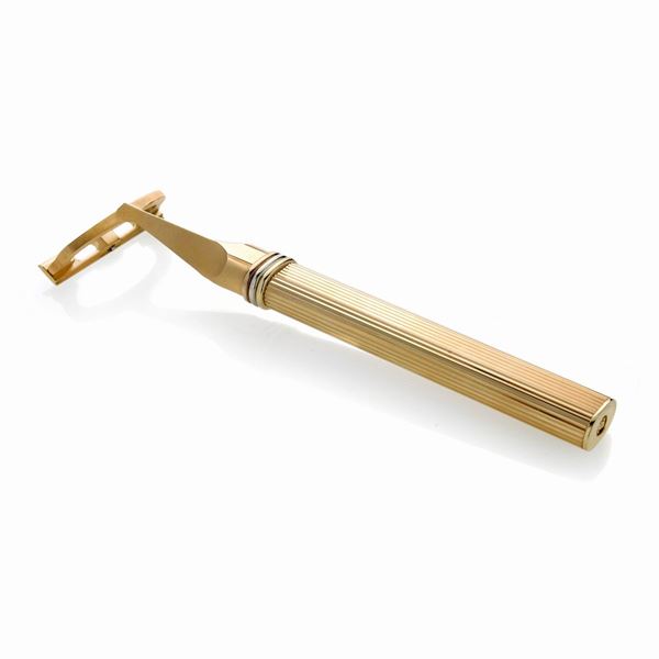 CARTIER - Razor in yellow gold plated, must de Cartier