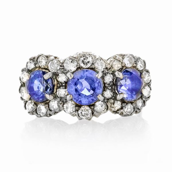Ring in white gold, silver, diamonds and sapphires