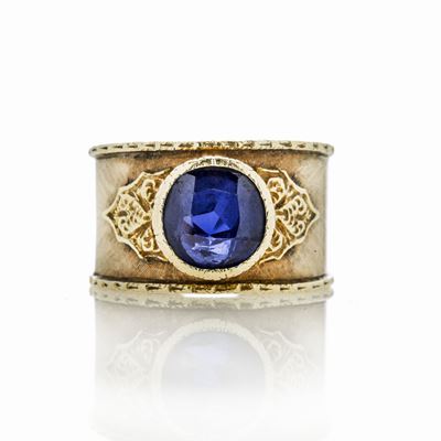 Anello a Fascia in Oro Giallo e Zaffiro