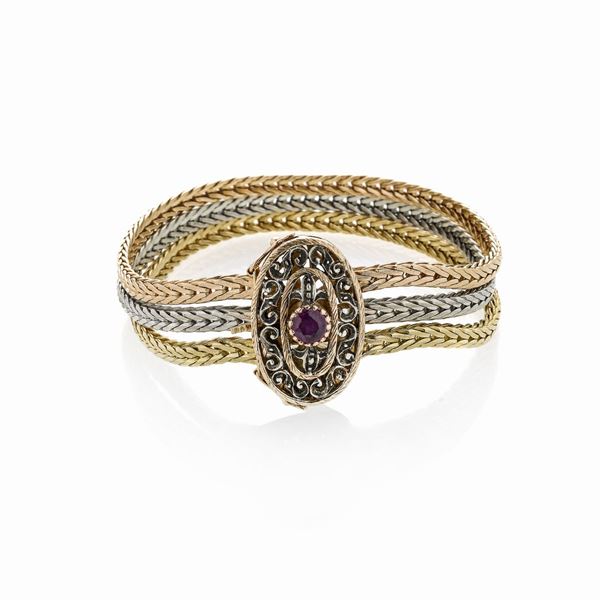 Bracciale in oro giallo, oro bianco, oro rosa e rubini