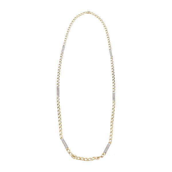 Long necklace in yellow gold, white gold and diamonds