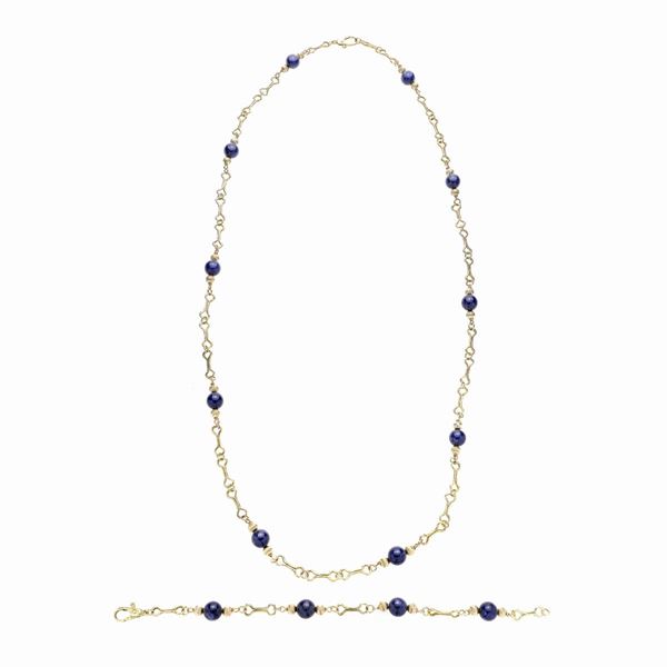 Set consisting of a long necklace and bracelet in yellow gold and lapis lazuli