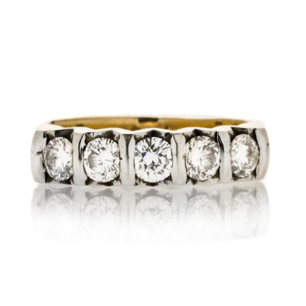 Riviere ring in white gold, yellow gold and diamonds