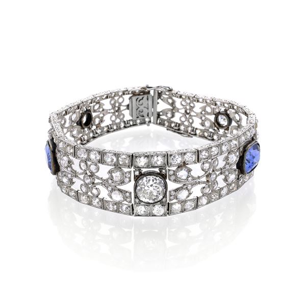 Bracelet in white gold, diamonds and blue stones