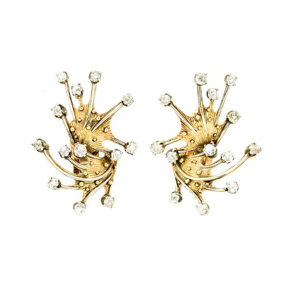 Pair of clip-on earrings in yellow gold, white gold and diamond