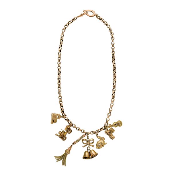 Low title gold necklace with charms