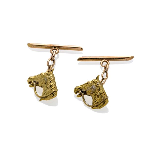 Pair of Animalier cufflinks in yellow gold and low-title gold