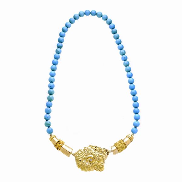 Necklace in yellow gold and turquoise