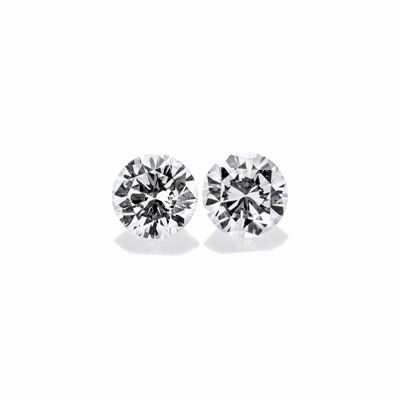 Lotto: Due Diamanti Taglio Brillante per Ct 0.55 e Montatura di Anello in Oro Bianco
