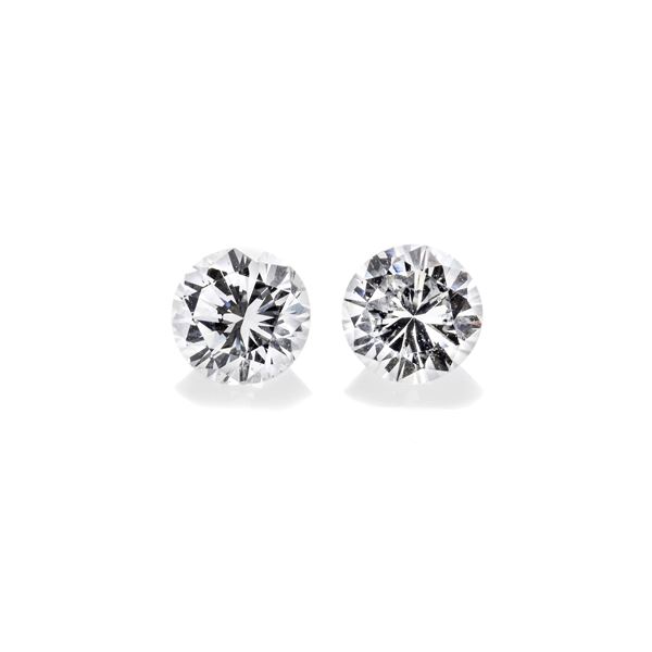 Lot: two brilliant-cut diamonds of 0.55 ct and a white gold ring