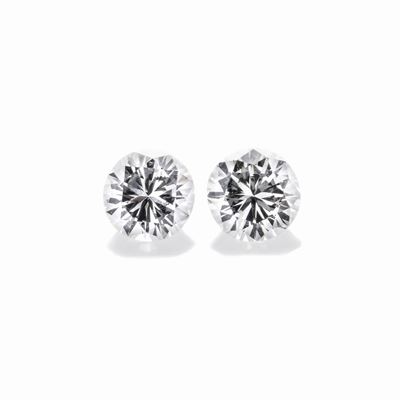 Lotto: Due Diamanti Taglio Brillante per Ct 0.56 e Montatura di Anello in Oro Bianco