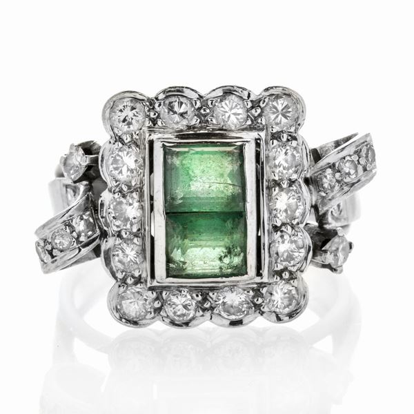 Ring in white gold, diamonds and emeralds