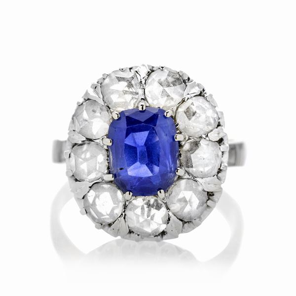 Ring in white gold, diamonds and sapphire