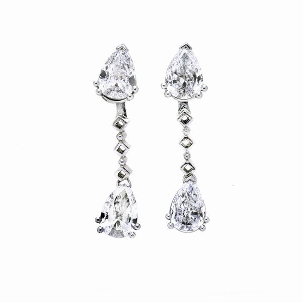 Pair of earring day and night in platinum and diamonds