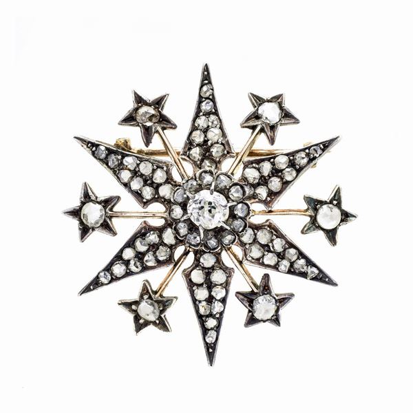 Spilla stella in oro a basso titolo, argento e diamanti