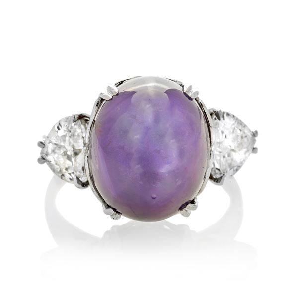 Ring in platinum, diamonds and natural purple starry sapphire