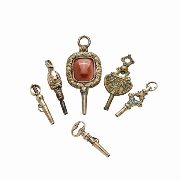 Lot of six gold watch keys in low title gold, princihbech and hard stones