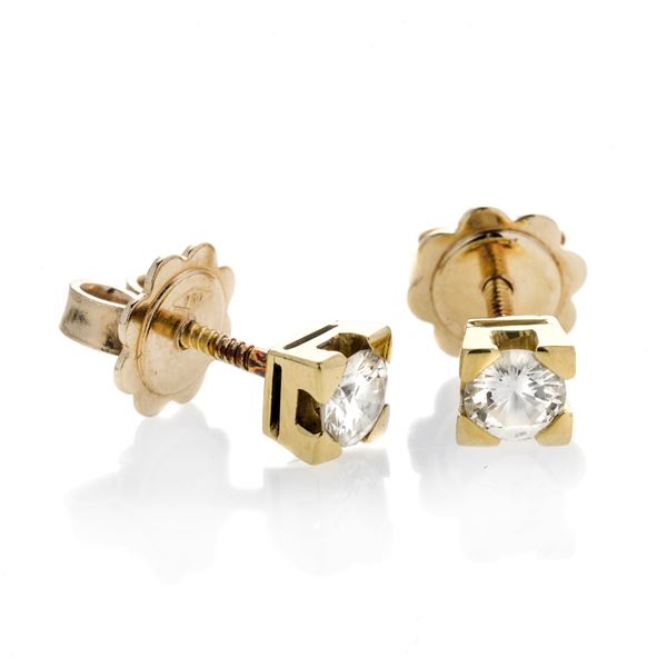 Pair of light point earrings in yellow gold and diamonds