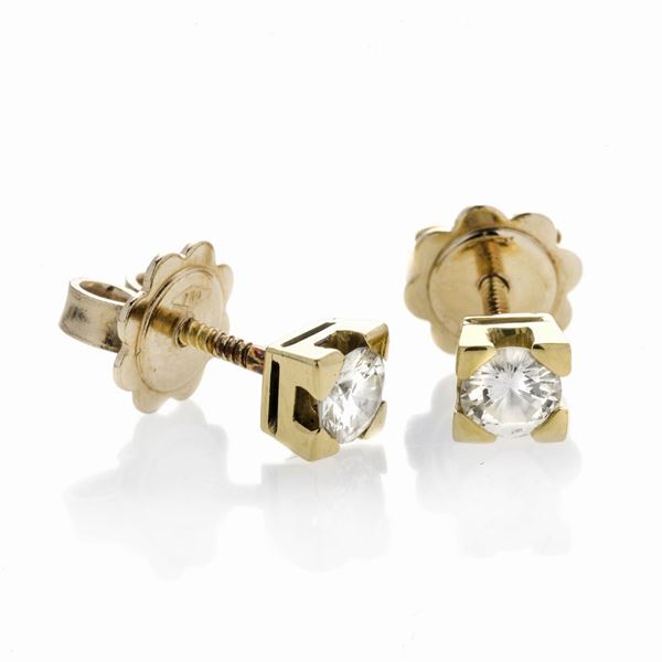 Pair of light point earrings in yellow gold and diamonds
