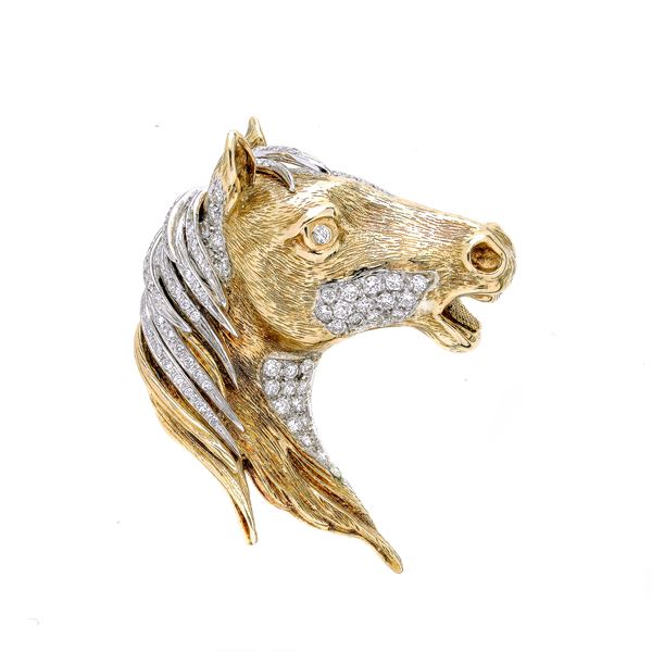 Horse head clip in yellow gold, white gold and diamonds