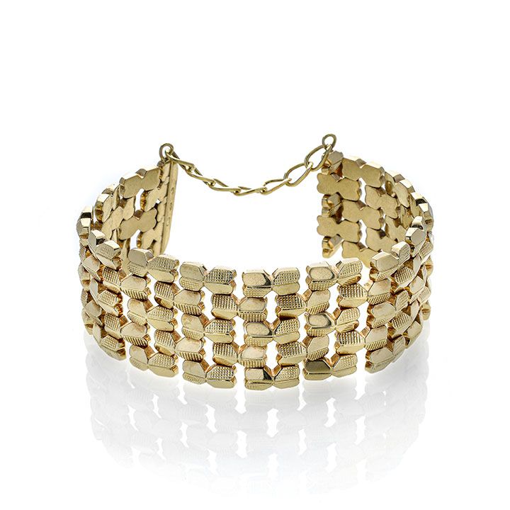 Alto bracciale in oro giallo a maglie intrecciate